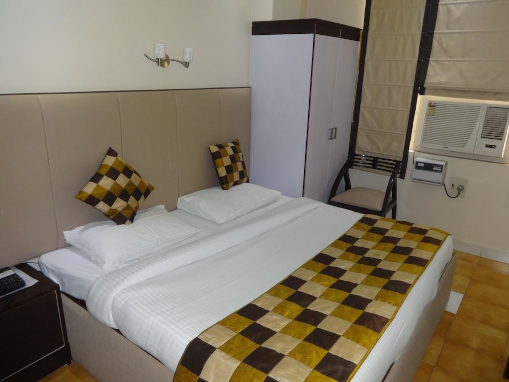 Hotel Grace New Delhi Kamer foto